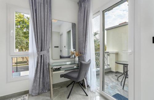Emirates Hills Villa | White Sage Brand New 3BR Villa with Garden and Two Balconies