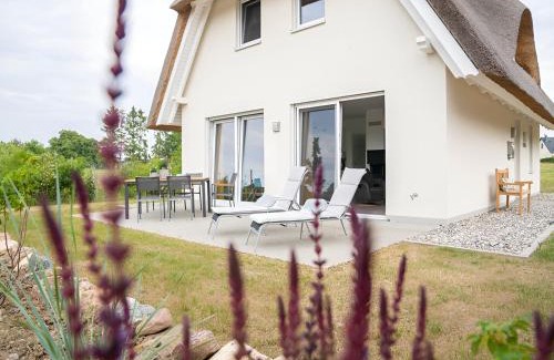Am Salzhaff House | Wiesenpieper - Ferienhaus mit Kamin, Sauna und Meerblick