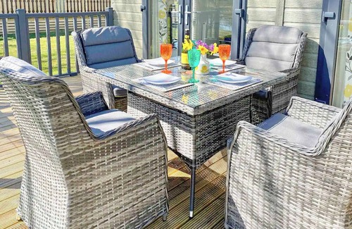 Carnforth Ski Chalet | Wine Down Retreat is a distinctive and luxurious lodge on Docker Holiday Park.