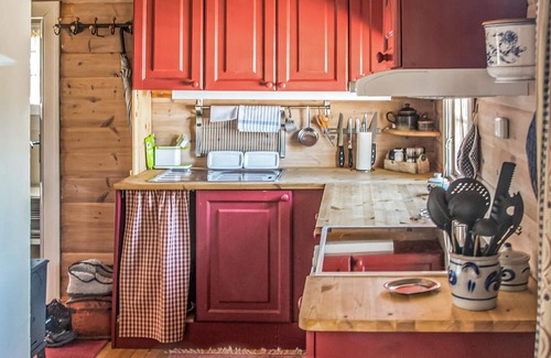 Rena House | Wonderful cottage with its own fireplace on the property.