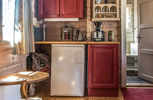 Rena House | Wonderful cottage with its own fireplace on the property.