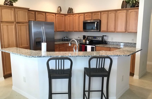 Lake Sumter Landing Villa | WOW! LOCATION! FUN! Includes HOT TUB, Gas Golf Cart, BBQ, & WIFI