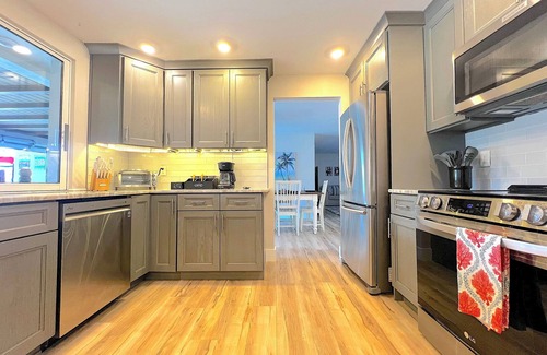 Yacht Club House | Yacht club area of Cape Coral w/Saltwater Pool, Dock & Theater Room