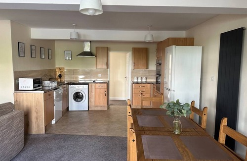 Stroud Apartment | Yellow sunflowers flat in Stroud by Golden Valley