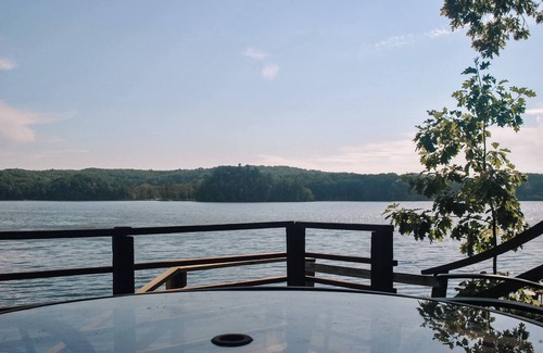 Newaygo House | Your lakeside story, powered by paddles and perfect moments.