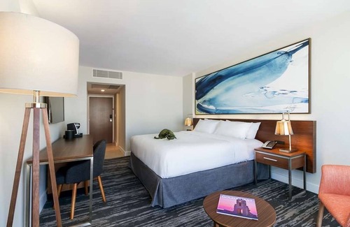 Central Beach Resort | Your Relaxing Getaway Awaits! 2 Pleasant Units, Onsite Infinity Pool!