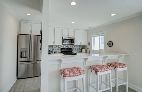 Surf City House | Your Ultimate Retreat – Steps from Beach with PVT Heated Pool, Slide & Hot Tub!