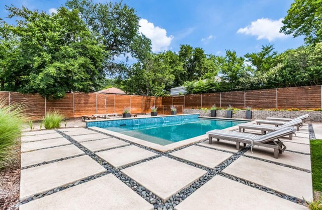1/2 acre with pool, hot tub, playground, cabana, & yard only 15 mins to downtown