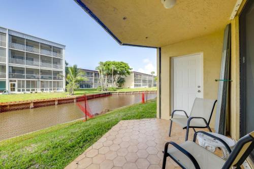 1 Mi to Lantana Beach Canal-View Condo with Pool