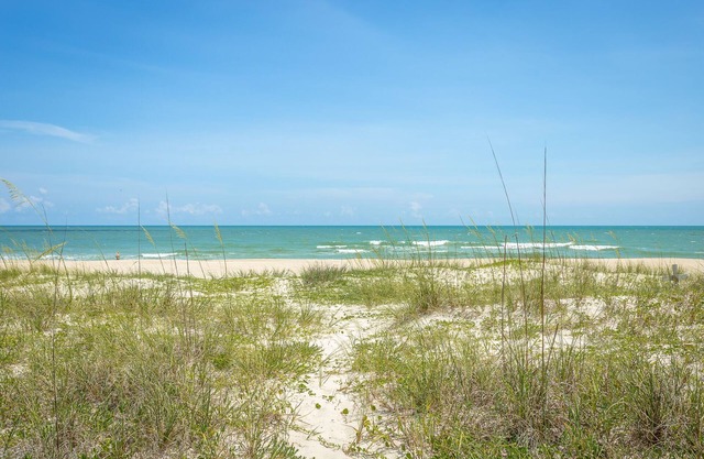 10% off November! Beachfront, ground level, 2bed/1bath, screened porch.