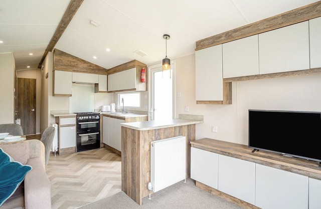 12ft-wide luxury caravan with one double and two twin.