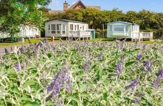 12ft-wide stylish and comfortable caravan with one double and one twin.