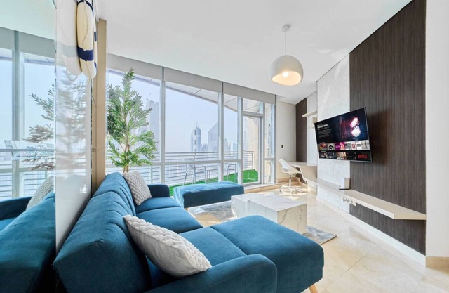 1BR Sky Gardens | Balcony with Stunning DIFC View