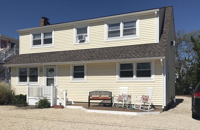 1st Fl of duplex. Sunsets over the bay, walk to beach. Great family getaway.