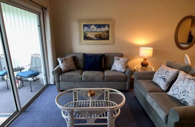 2 BDRM Sunset Beach Condo: Screened Patio with view of Jones/Byrd 10th hole.