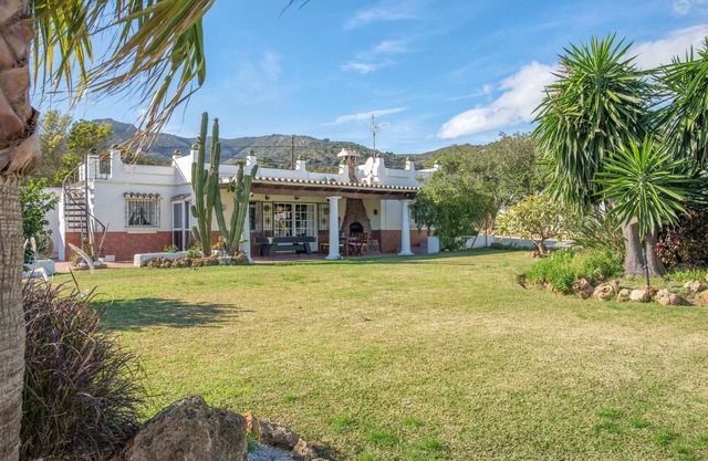 2 houses in the big garden, 4 bedrooms, 2 private kitchens, heated pool