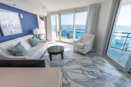 2BR beach condo w heated pools & views