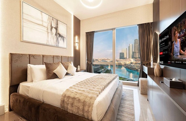 2BR Burj & Fountain Views | PS5 + Pool Access
