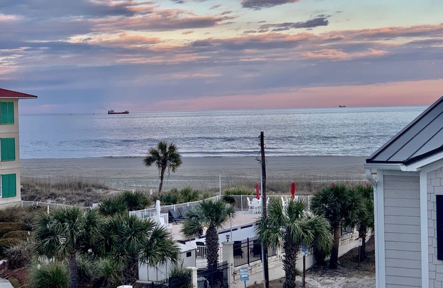 30 Steps to the Beach! Luxury Condo with Large wrap-around porch!