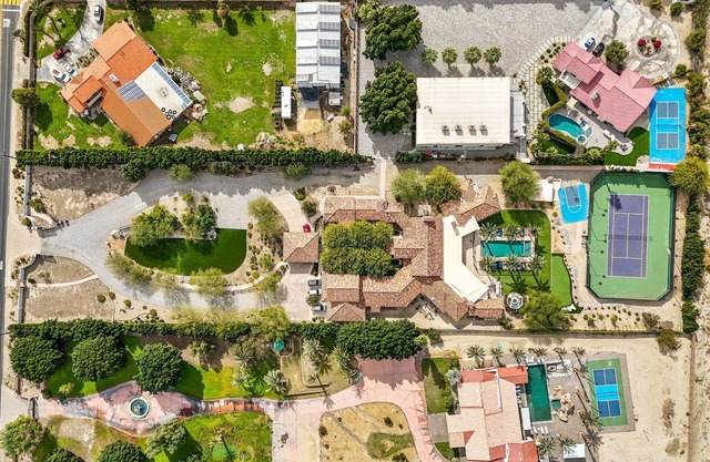 4+ acre property 12 bedrooms 11 bathrooms 2 pools