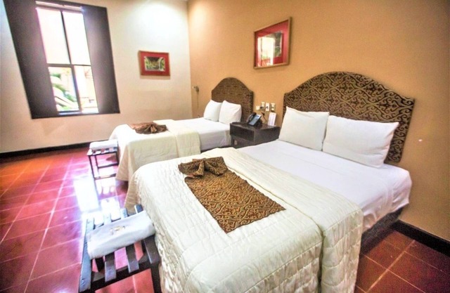 4-Stay, 2 Double Rooms: Charming Room Near Mérida’s Cultural Landmarks