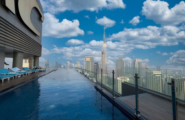 5-Star Amenities on 55th Floor 2BR with Burj View & Infinity Pool