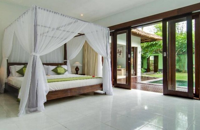 7 bedrooms, 3 villas, 3 private pools, central seminyak, cleaning staff