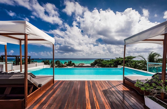 8 bedroom abode just steps away from the idyllic white sandy beach and tranquil turquoise water!