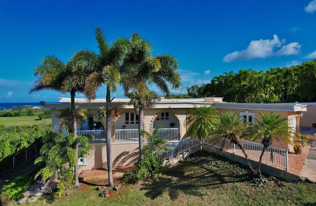 A Beautiful And Unique Two Story Vacation Home On One Acre Of Land In Camuy.