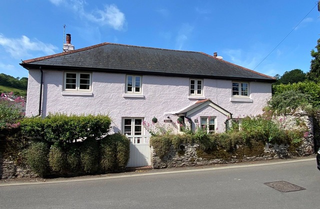 A charming detached cottage with lovely garden and parking. EV charger available