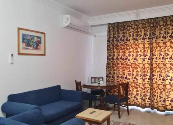 A cozy room in 2 bedrooms apartment with a back yard