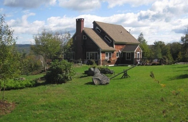 A post and beam home in a private setting with wonderful mountain views. n