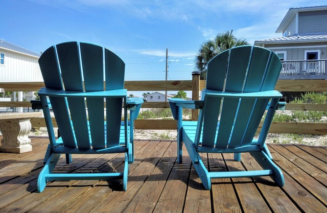 A secluded 3 bedroom, 2 bath Gulf view home nestled in lush tropical vegetation