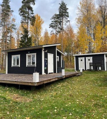 A simple stuga on a lake incinerating toilet in a separate building next to the cabin Water for drinking and washing hands dishes comes from two containers that attach to a faucet through a simple electric pump OBS no shower on site