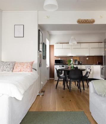A studio apartment with workspace