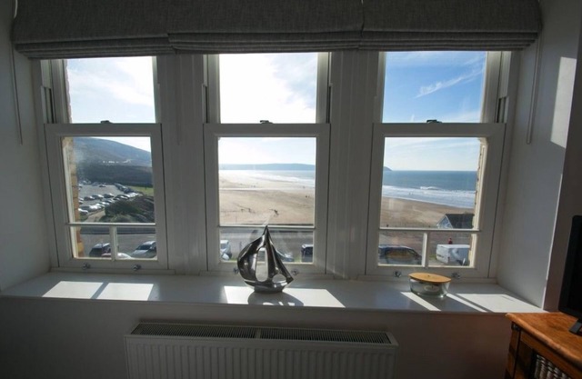 A stunning 3 bedroom, 3 bathroom 1st floor apartment with superb seaviews opposite main beach!