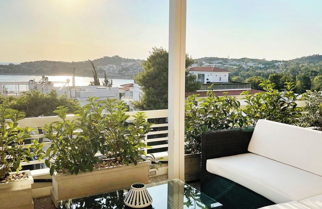 A unique 3 level penthouse with a great sea view to Vouliagmeni Bay