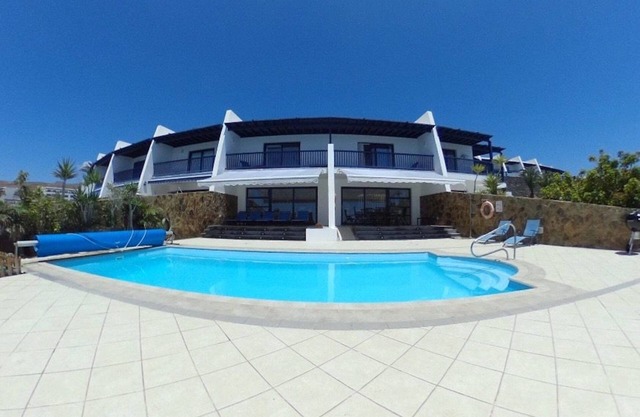 A Wonderful Frontline Villa to Watch the Boats Go By!