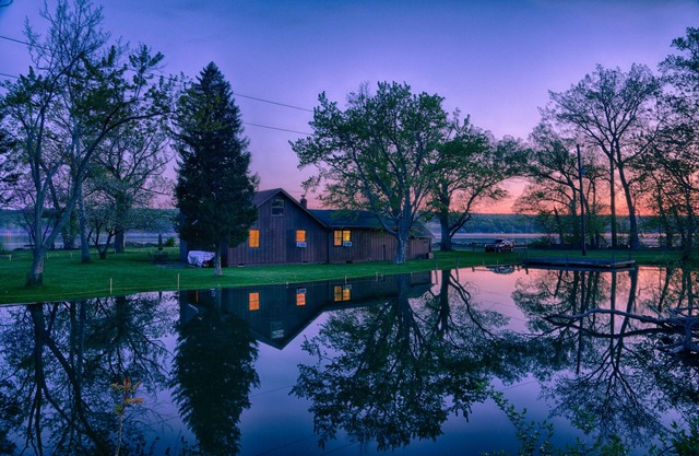 Almost an island in Cayuga Lake! Private & panoramic 650' of level lake frontage