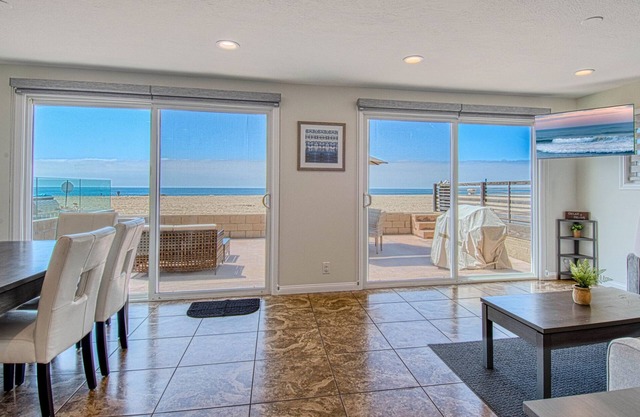 Amazing location with an amazing, newly-remodeled lower unit right on the sand!