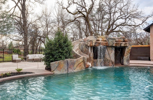 Amazing pool w/water slide, basketball court, country living, house is dialed!