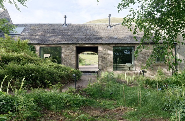 An architect designed rural retreat near Edinburgh with wood-fired sauna.