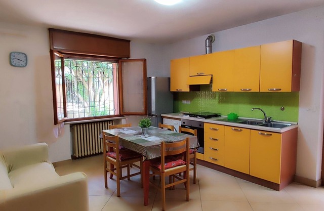 Apartment by the sea with garden, beach included