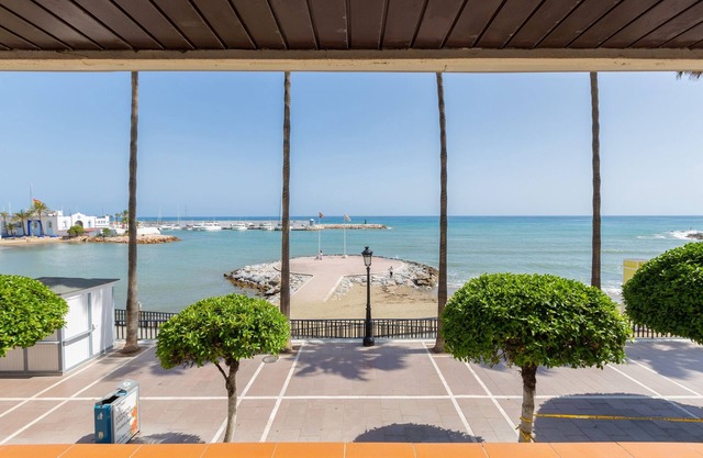 Apartment 'En 1ª Línea De Playa' with Sea View, Shared Pool and Wi-Fi