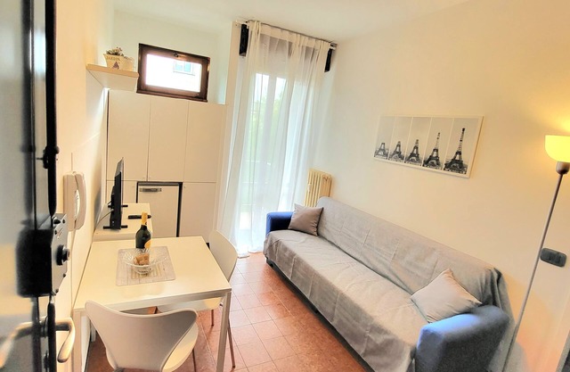Apartment in front of the hospital with garage and bicycle