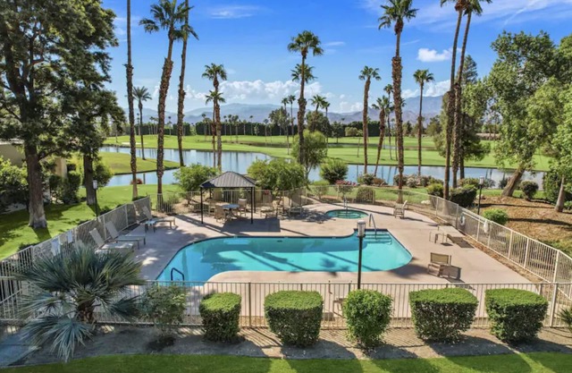 Awesome lake, golf course, mountain view Desert Princess Country Club condo!