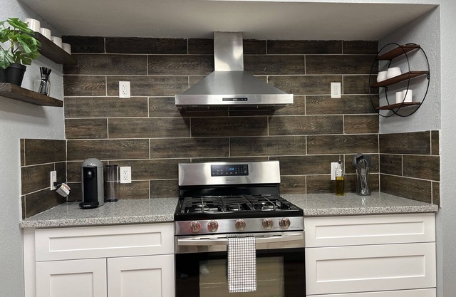 Awesome remodeled home with a movie room and a massive backyard with a firepit