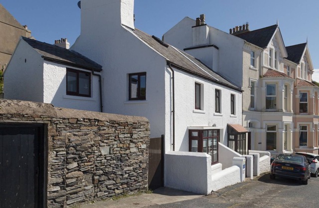 Baljean is a charming, eighteenth century cottage, enjoying an enviable position overlooking Port Er