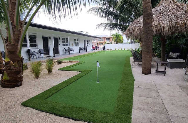 Beach Block Bungalow with private putting green. Everything need.