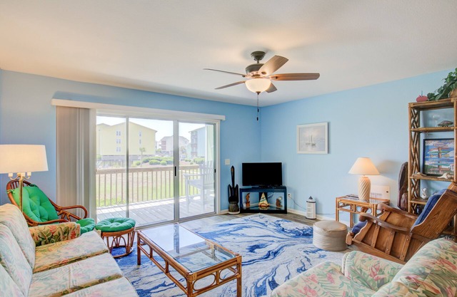 Beach condo with pool, sundecks, outdoor showers & direct beach access